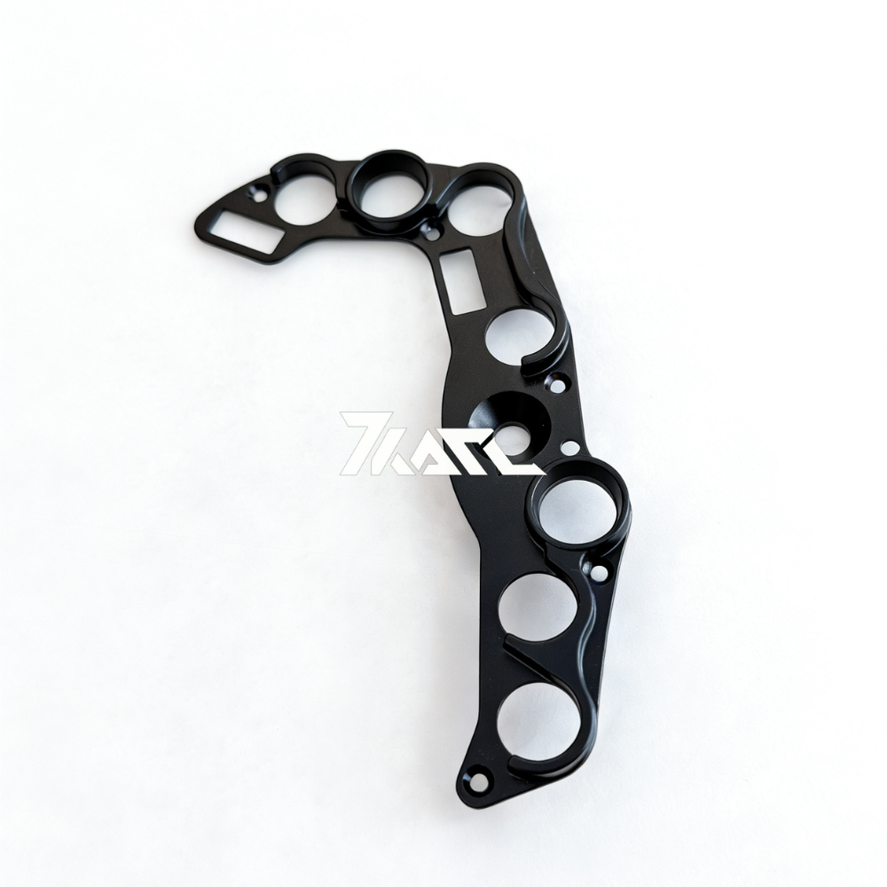 Black CNC-machined button plate for Ascher Wheels, featuring multiple circular and rectangular cutouts in a precision-engineered design.