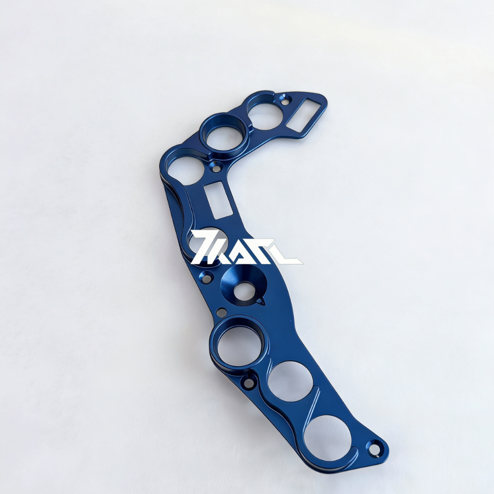 Blue anodized aluminum curved CNC button plate for Ascher Wheels, featuring multiple circular button holes and precise cutouts for sim racing setups.