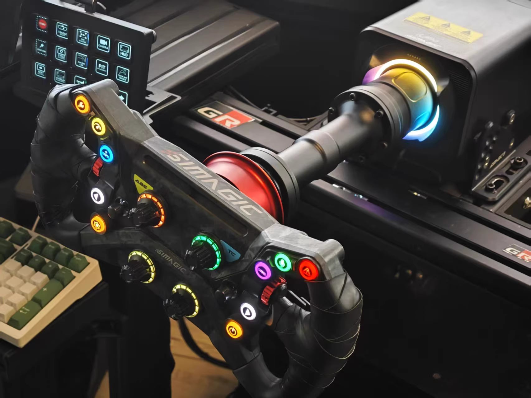 Simagic Alpha EVO extension adapter mounted on racing wheel setup
