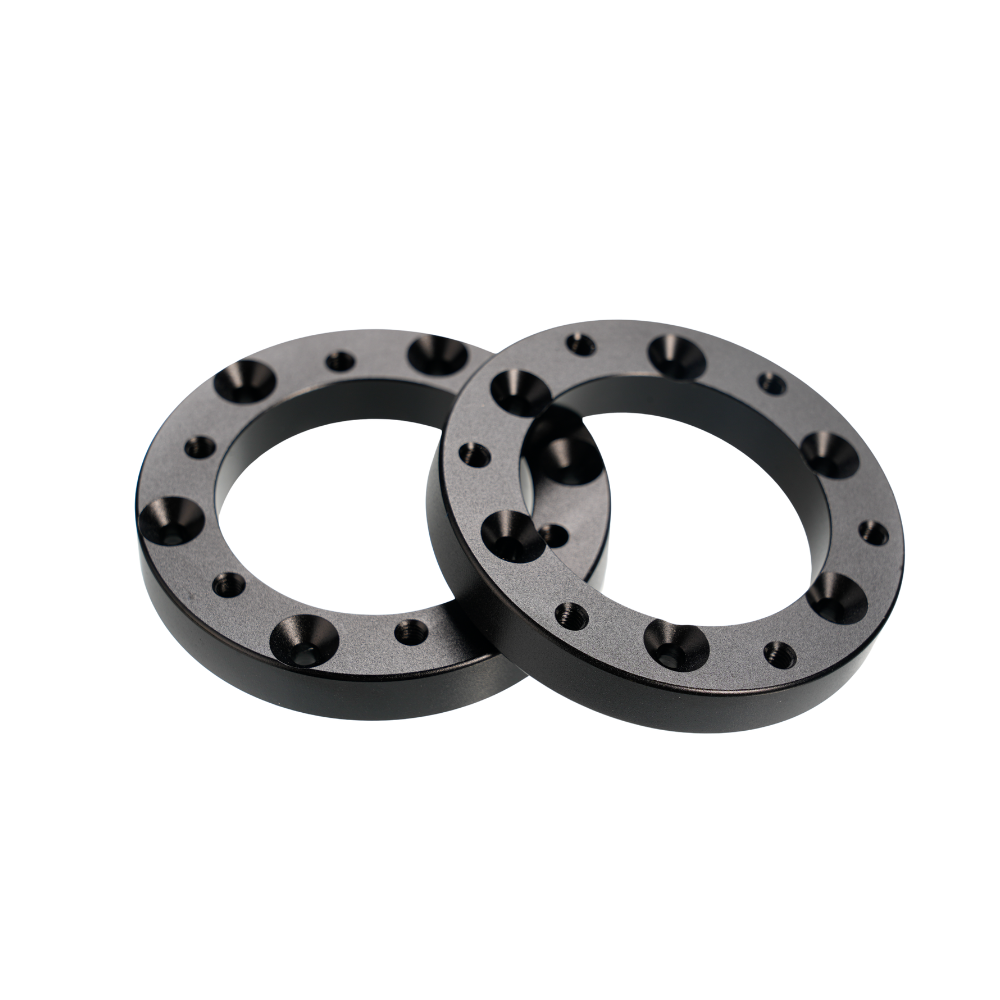 Black metal extension adapters for Simagic Alpha EVO sim racing