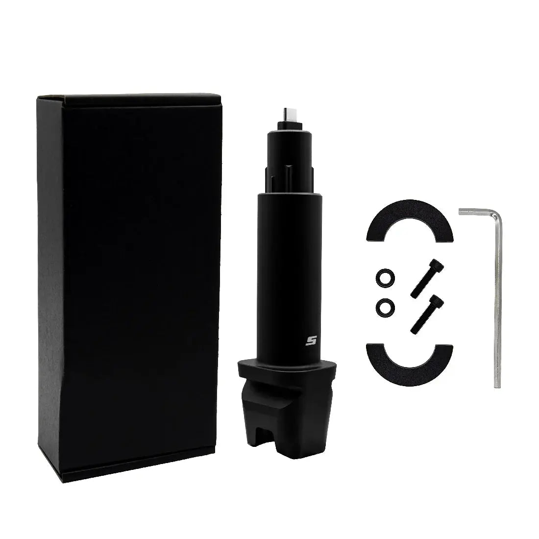 Black mechanical component with packaging and tools on a white background