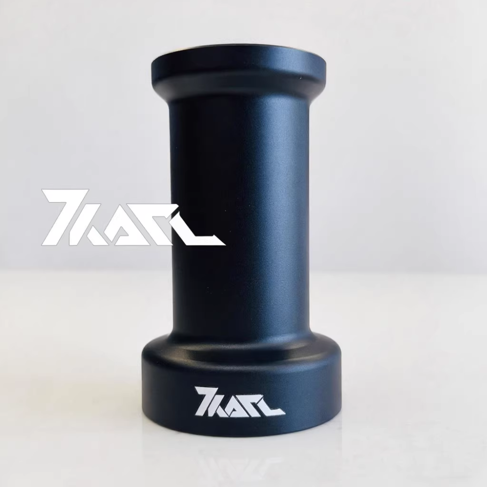 Matte black KARL extender for Simucube 2 with dual branding