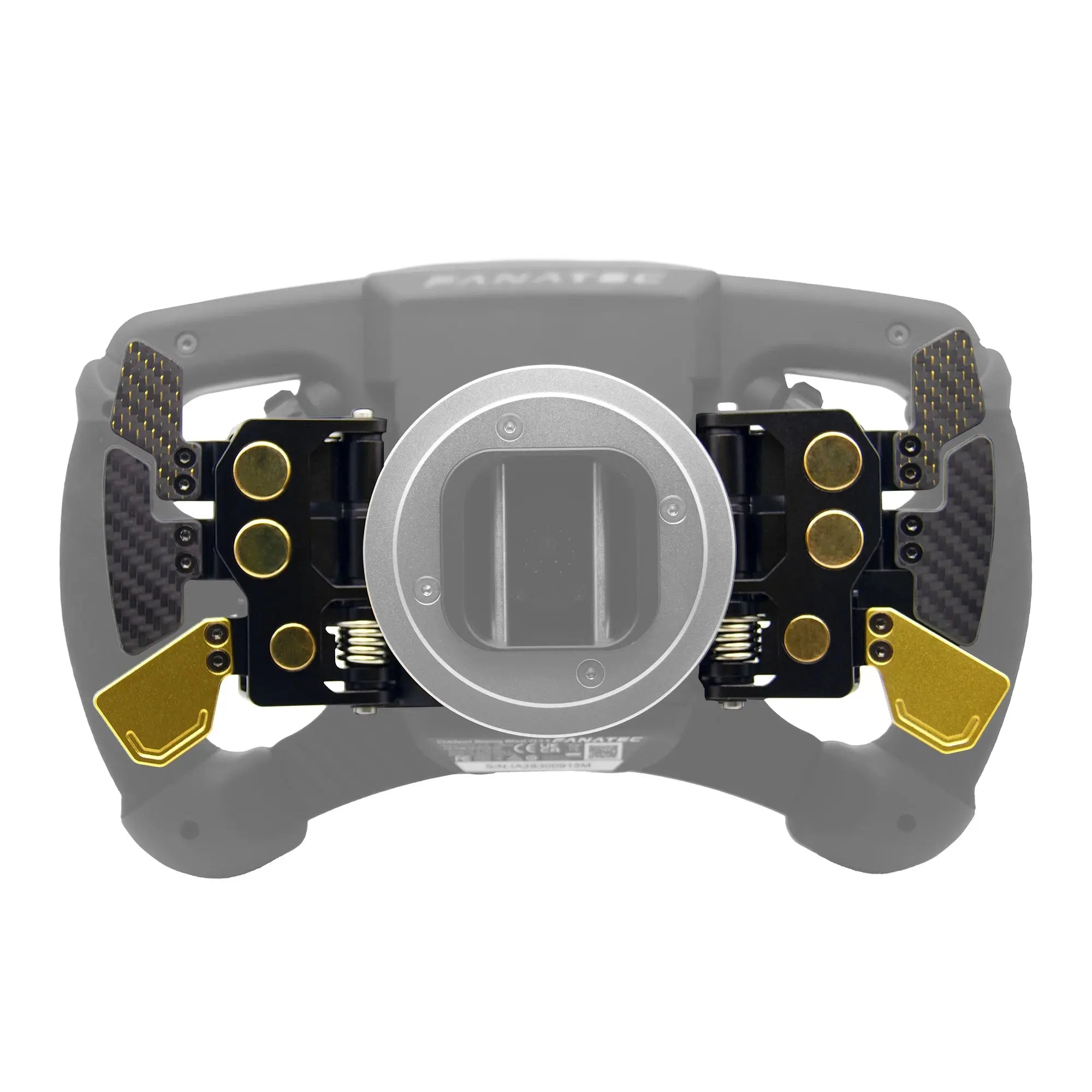 Close-up of a steering wheel with carbon fiber and gold accents on a white background