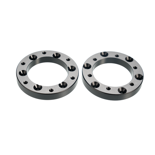 Black circular extension adapters for Simagic Alpha EVO sim racing setup