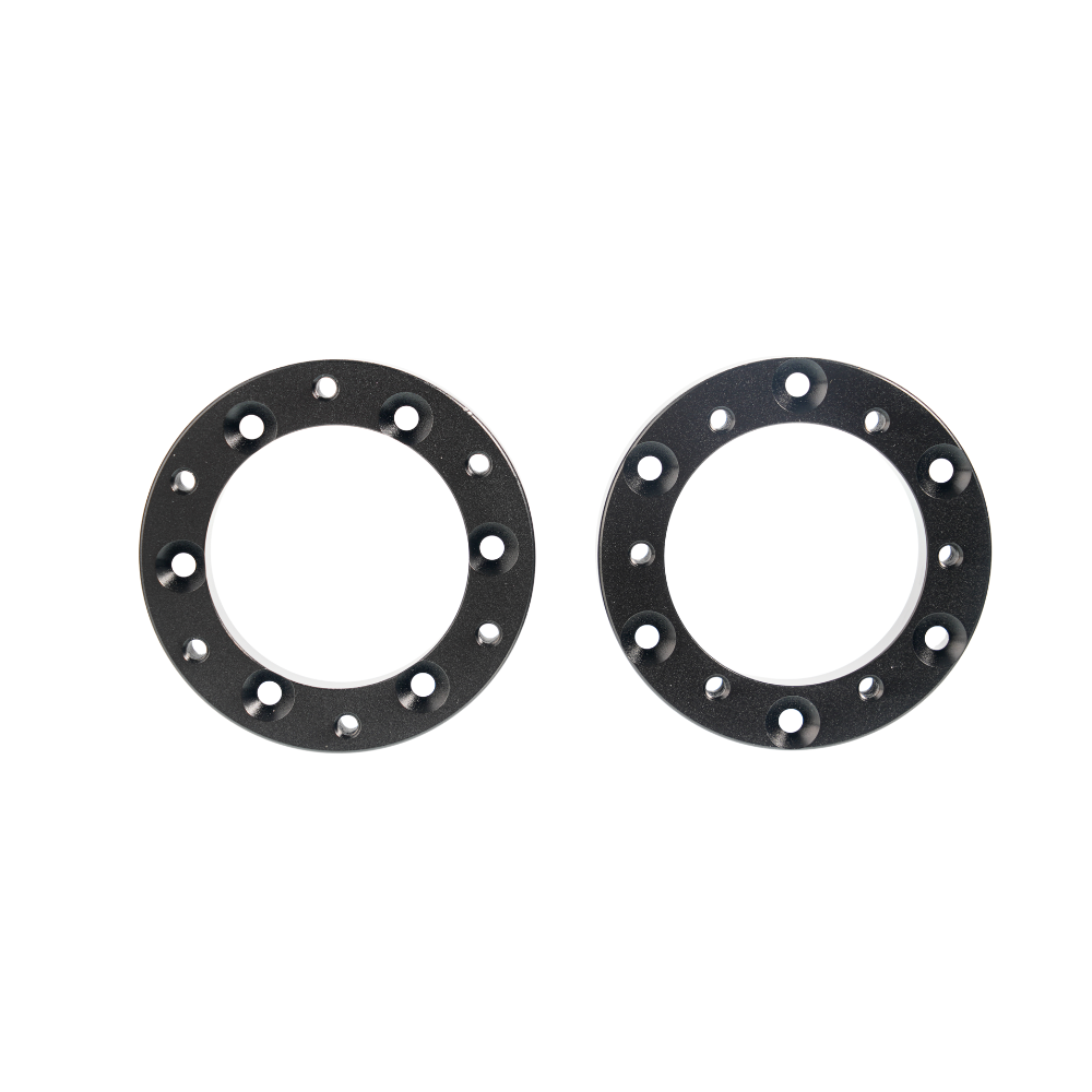 Black circular extension adapters for Simagic Alpha EVO sim racing setup