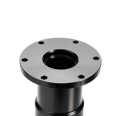Close-up of black shaft extension flange with mounting holes