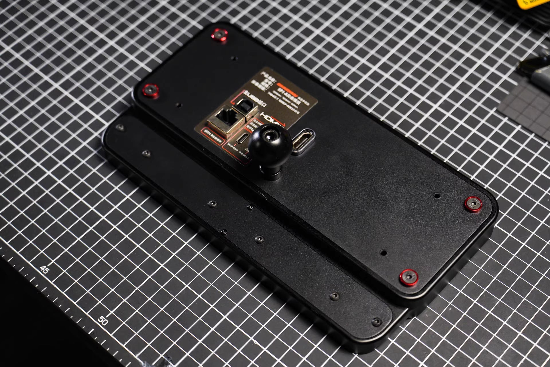 SimNanmu Trucksim dashboard with red accents, joystick control on grid mat - IGNI RACING